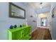 Bright entryway featuring a green console table and decorative mirrors at 2 15Th Ave # 301, Indian Rocks Beach, FL 33785