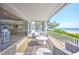 Inviting outdoor balcony showcases comfortable seating and stunning ocean views at 20256 Gulf Blvd, Indian Shores, FL 33785