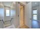 Home interior with a staircase and an open elevator with metal gate at 20256 Gulf Blvd, Indian Shores, FL 33785