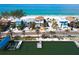 Coastal property featuring Mediterranean-style design and waterfront access to pristine beach at 20256 Gulf Blvd, Indian Shores, FL 33785
