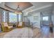 Elegant foyer with luxury finishes, hardwood floors, statement chandelier and staircase at 20256 Gulf Blvd, Indian Shores, FL 33785