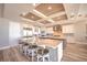 Open kitchen featuring stainless steel appliances, large island with seating, and modern fixtures at 20256 Gulf Blvd, Indian Shores, FL 33785