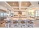 Gorgeous kitchen with marble countertops, large island with seating and pendant lighting at 20256 Gulf Blvd, Indian Shores, FL 33785