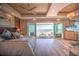 Comfortable main bedroom with balcony access, ocean views, and luxury finishes at 20256 Gulf Blvd, Indian Shores, FL 33785