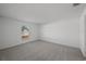 Bright bedroom with carpet flooring, neutral paint, and window allowing natural light at 23343 Van Buren Ave, Port Charlotte, FL 33981