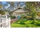 Lovely craftsman bungalow with landscaped yard and white picket fence at 2608 2Nd N Ave, St Petersburg, FL 33713