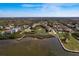 Well maintained waterfront property with pond, community pool, boardwalk and beautiful neighborhood views at 351 Windrush Loop, Tarpon Springs, FL 34689