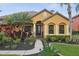 Beautiful front exterior view of home with well-maintained lawn and beautiful landscaping at 3637 Ballastone Dr, Land O Lakes, FL 34638