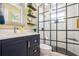 Chic bathroom featuring patterned tile flooring, black framed shower, and modern vanity at 3715 98Th N Ave # 3, Pinellas Park, FL 33782