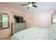 Comfortable bedroom with dresser and large mirror at 3715 98Th N Ave # 3, Pinellas Park, FL 33782