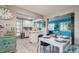 Bright dining area adjacent to the kitchen, featuring hard surface floors and bright paint at 3715 98Th N Ave # 3, Pinellas Park, FL 33782