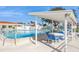 Inviting pool with poolside tables and chairs offer a relaxing experience at 3715 98Th N Ave # 3, Pinellas Park, FL 33782
