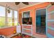Inviting sunroom with a television and view to the backyard and an adjacent room at 3715 98Th N Ave # 3, Pinellas Park, FL 33782
