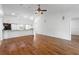 Open-concept living room and kitchen area with modern finishes at 4069 102Nd N Pl, Clearwater, FL 33762