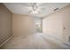 Neutral bedroom with carpet, a ceiling fan, and one window at 4582 Fox Lake Ct, Clearwater, FL 33762