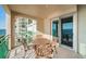 Balcony featuring seating and scenic views of the waterfront and the surrounding neighborhood at 4830 Osprey S Dr # 305, St Petersburg, FL 33711