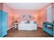 Coastal bedroom with seaside decor, wood floors and a light and airy feel at 4830 Osprey S Dr # 305, St Petersburg, FL 33711