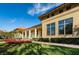 Exterior view of a light-colored building with a red tile roof, columns, and well-manicured landscaping at 4830 Osprey S Dr # 305, St Petersburg, FL 33711