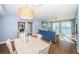 Open concept dining area with waterfront views and seamless flow into the living room at 4830 Osprey S Dr # 305, St Petersburg, FL 33711