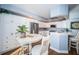 Updated kitchen with stainless appliances and a cozy breakfast nook at 4830 Osprey S Dr # 305, St Petersburg, FL 33711