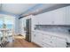 Bright kitchen featuring updated cabinets and a view of the water at 4830 Osprey S Dr # 305, St Petersburg, FL 33711