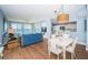 Bright living room with beautiful waterfront views and dining area at 4830 Osprey S Dr # 305, St Petersburg, FL 33711