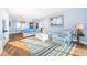 Living room with wood floors and waterfront views at 4830 Osprey S Dr # 305, St Petersburg, FL 33711