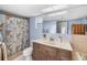 Bathroom featuring a shower-tub combination and vanity with a marble countertop at 5024 Cedarbrook Ln, Hernando Beach, FL 34607