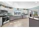 Bright kitchen with modern appliances, ample counter space, and water views at 5024 Cedarbrook Ln, Hernando Beach, FL 34607