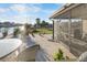 Enjoy the outdoors with a screened-in lanai and views of the lush backyard and waterfront at 5024 Cedarbrook Ln, Hernando Beach, FL 34607