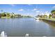 Scenic canal view with boats docked along the waterway in a serene coastal setting at 5024 Cedarbrook Ln, Hernando Beach, FL 34607