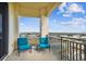 Comfortable balcony featuring a set of chairs and small table with nice views of the community at 5823 Bowen Daniel Dr # 1606, Tampa, FL 33616