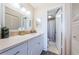 Bright bathroom with an enclosed shower, providing both style and functionality at 6210 Sun Blvd # 408, St Petersburg, FL 33715