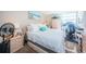 Bright and airy bedroom featuring a comfortable bed, work space, and natural light at 6210 Sun Blvd # 408, St Petersburg, FL 33715