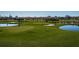 Well-maintained golf course with lush green grass, sand traps and water features at 6210 Sun Blvd # 408, St Petersburg, FL 33715