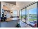 Kitchen and dining area featuring balcony and golf course views at 6210 Sun Blvd # 408, St Petersburg, FL 33715