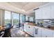 Kitchen and dining area with views of the golf course at 6210 Sun Blvd # 408, St Petersburg, FL 33715