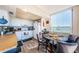 Bright kitchen and eating area featuring a view of the golf course at 6210 Sun Blvd # 408, St Petersburg, FL 33715
