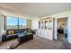 Bright living room with expansive windows offers abundant natural light and pleasant views at 6210 Sun Blvd # 408, St Petersburg, FL 33715