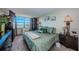 Serene main bedroom with golf course view and comfortable furnishings at 6210 Sun Blvd # 408, St Petersburg, FL 33715
