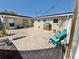 Cozy backyard patio with brick pavers, string lights, and comfortable outdoor seating for relaxing at 6310 57Th N Ave, St Petersburg, FL 33709