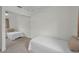 Simple bedroom with a bed, mirrored closet doors, and carpet at 6310 57Th N Ave, St Petersburg, FL 33709