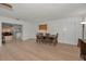 Dining area featuring hardwood floors, a wooden table and chairs, and natural light at 6310 57Th N Ave, St Petersburg, FL 33709