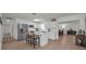 Modern kitchen with white cabinets, stainless steel appliances, and a spacious island at 6310 57Th N Ave, St Petersburg, FL 33709
