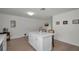 Spacious kitchen with island seating, showcasing its modern design and ample counter space for food preparation at 6310 57Th N Ave, St Petersburg, FL 33709