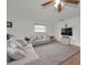 Comfortable living room with plush seating and a patterned rug, creating a cozy and inviting atmosphere for relaxation at 6310 57Th N Ave, St Petersburg, FL 33709