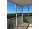 Balcony showing the waterfront view with trees and a lake at 6425 Shoreline Dr # 10506, St Petersburg, FL 33708