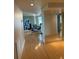 Hallway view showing a dining area with unique details and wood floors at 6425 Shoreline Dr # 10506, St Petersburg, FL 33708