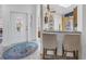 Inviting foyer featuring a decorative glass door and a tiled floor leading to the kitchen at 992 San Carlos Ne Ct, St Petersburg, FL 33702