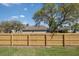 A new wooden fence for backyard privacy, enhancing the property's security and aesthetic appeal at 10249 Villa Palazzo Ct, Tampa, FL 33615